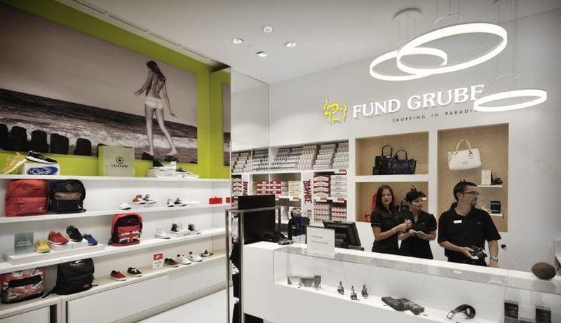 专卖店设计之商品陈列法则|| 名设网专卖店设计效果图案例-6