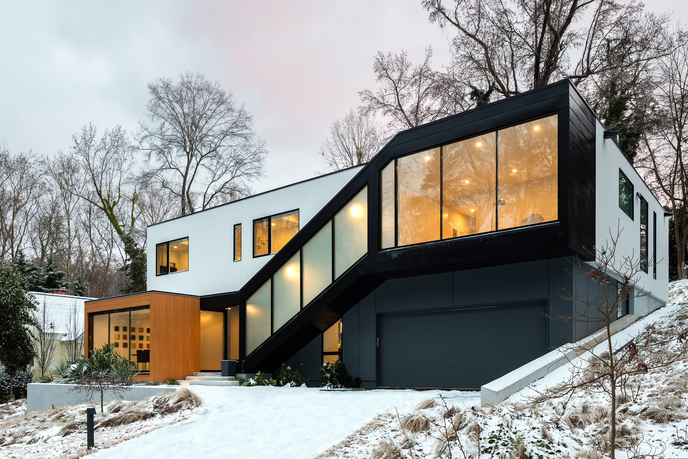 Black stairwell cuts across front of North Carolina home-3