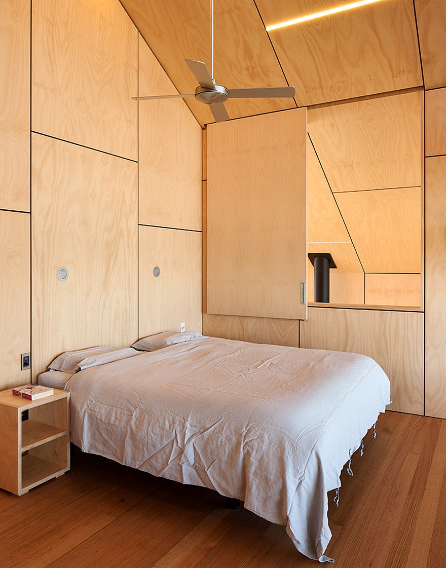 Rusted Steel Cladding House with Crafted Interior Finishes-17