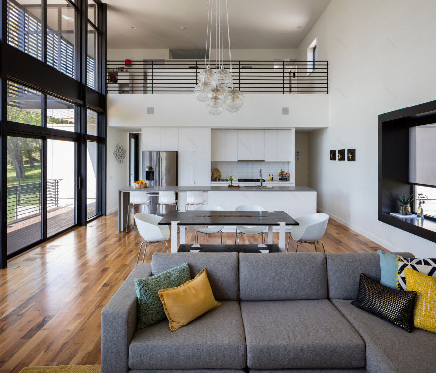 Kem Studio wraps lakeside Missouri residence in cypress and white stucco-14