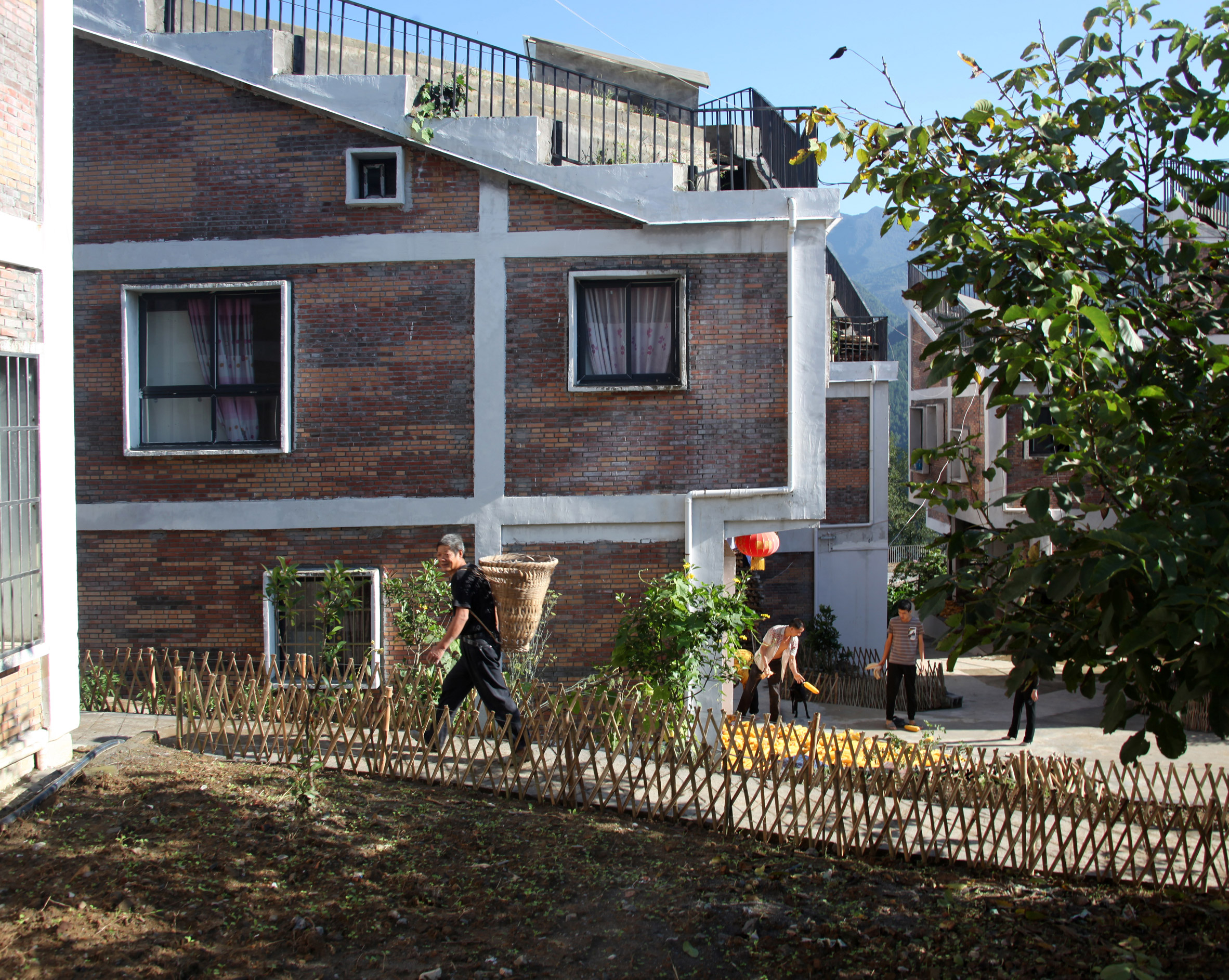 Rural Urban Framework builds post-disaster housing in China-22
