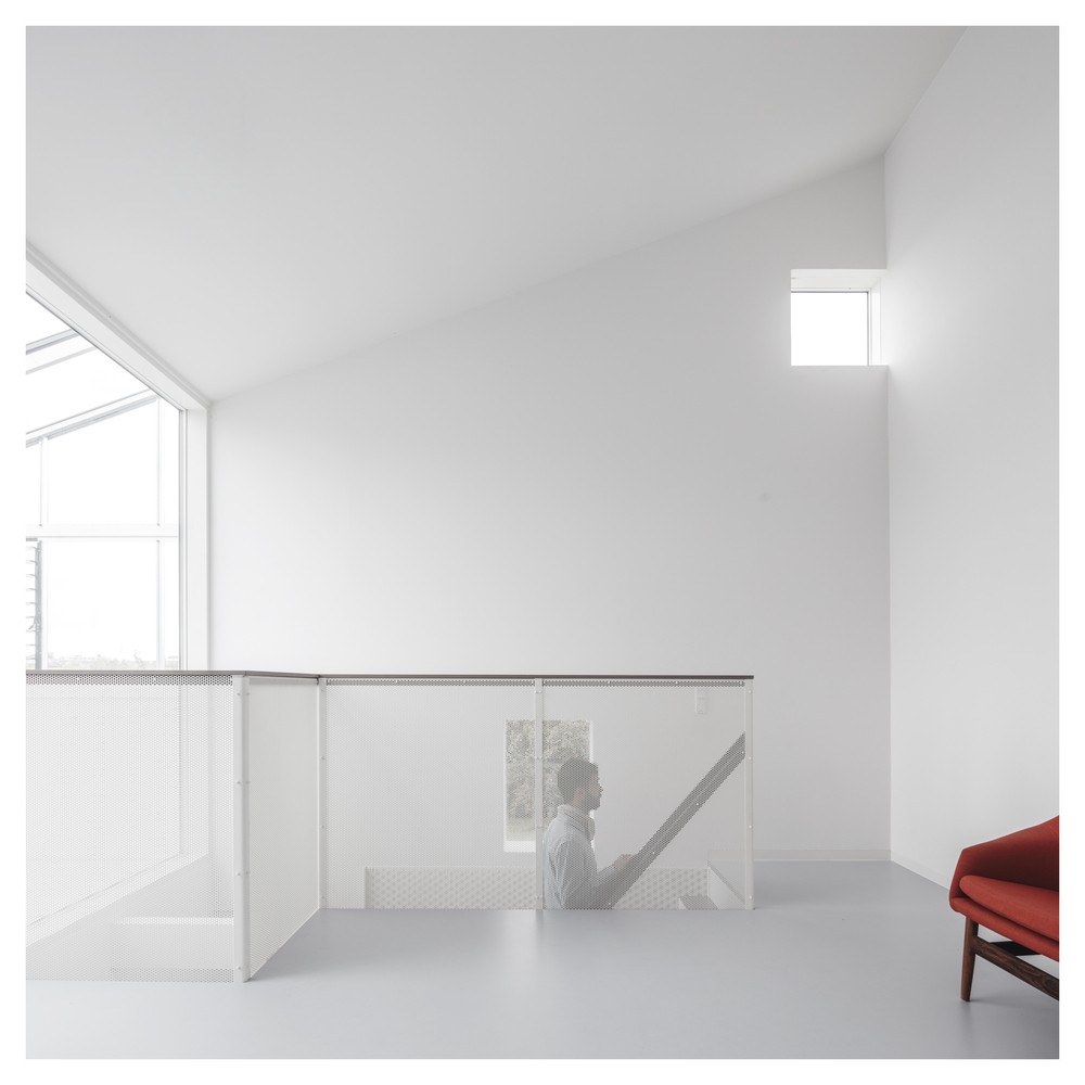 Helmet 住宅，坡屋顶的垂直扩建 / Werkt-10