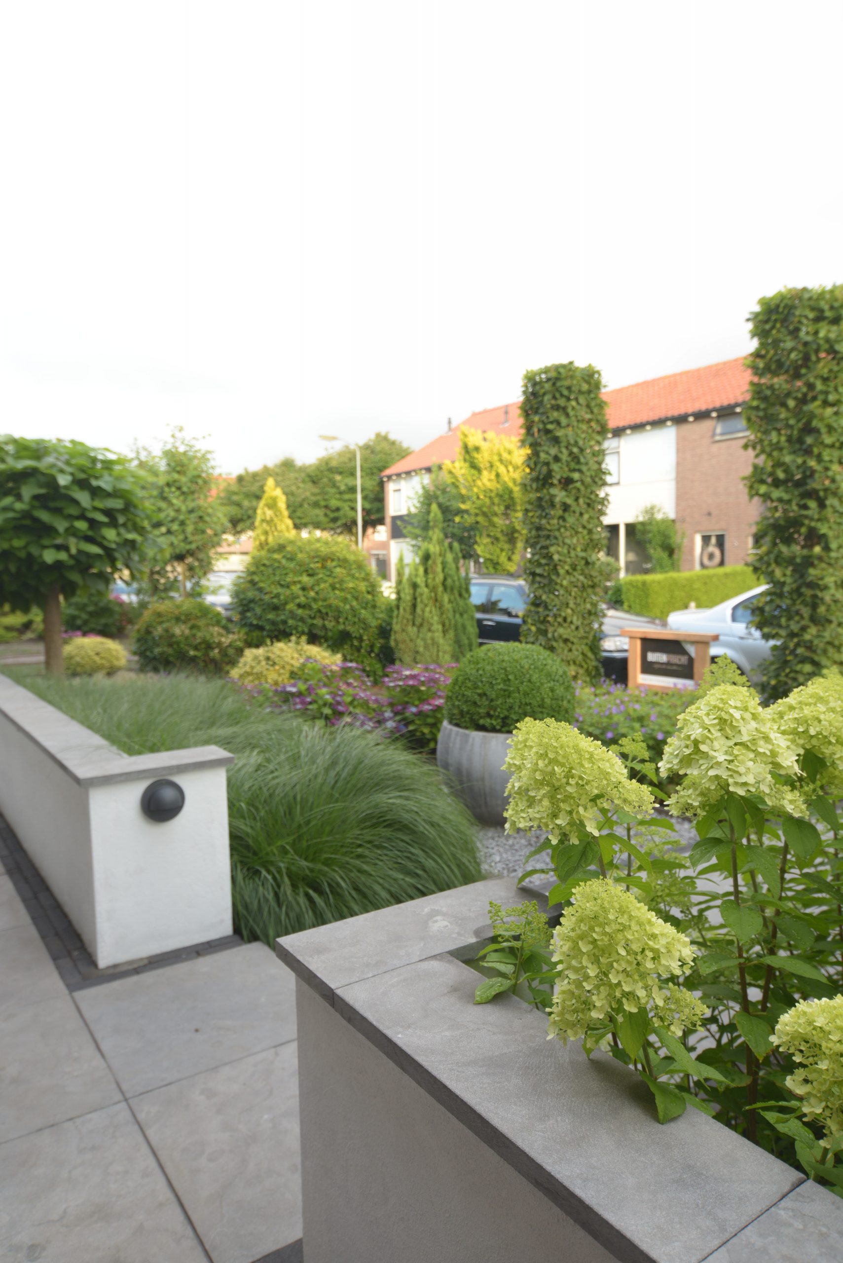 Landscaping with pond and veranda-14