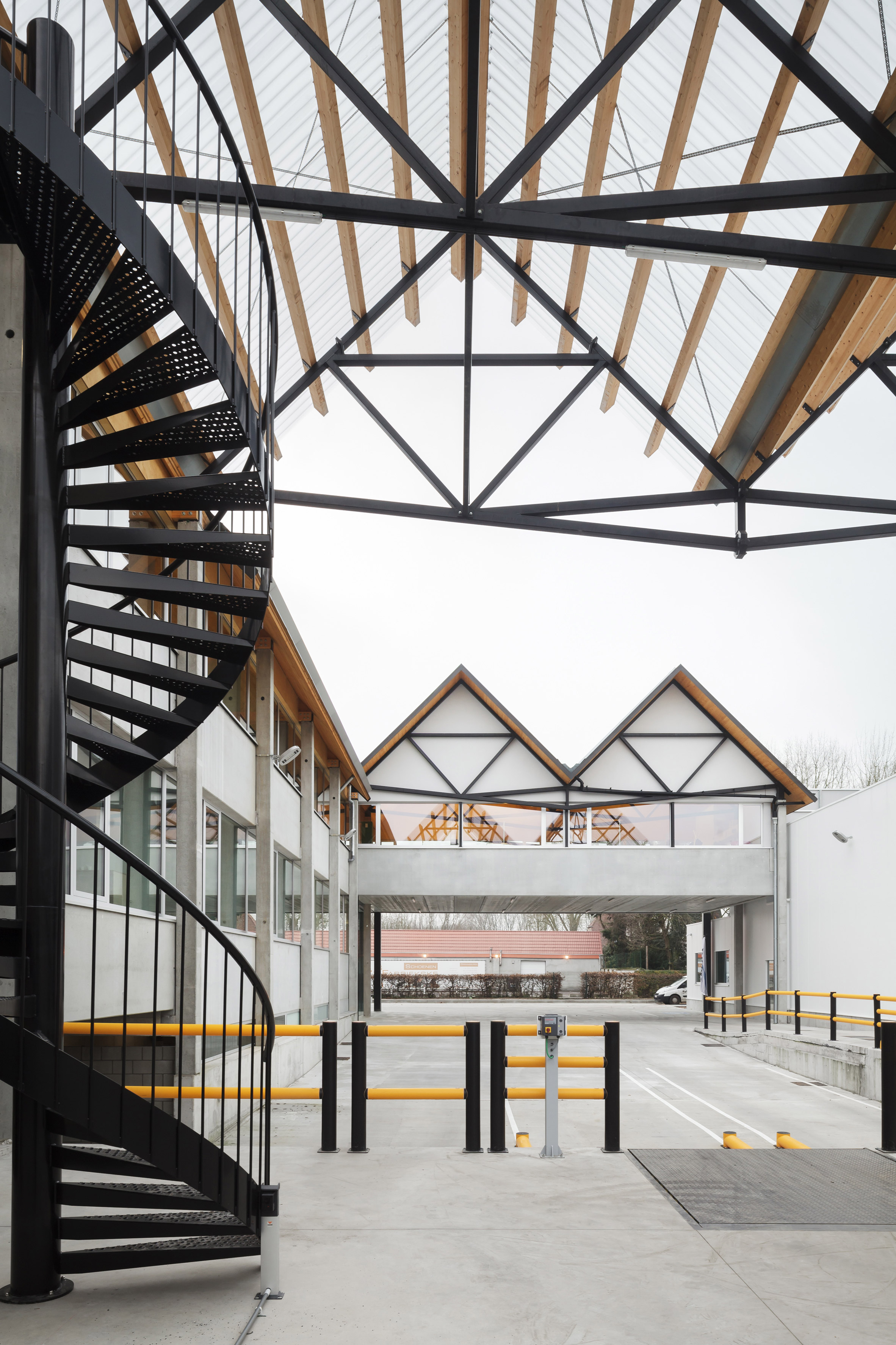 Factory with pitched roofs designed to complement terraced housing-5