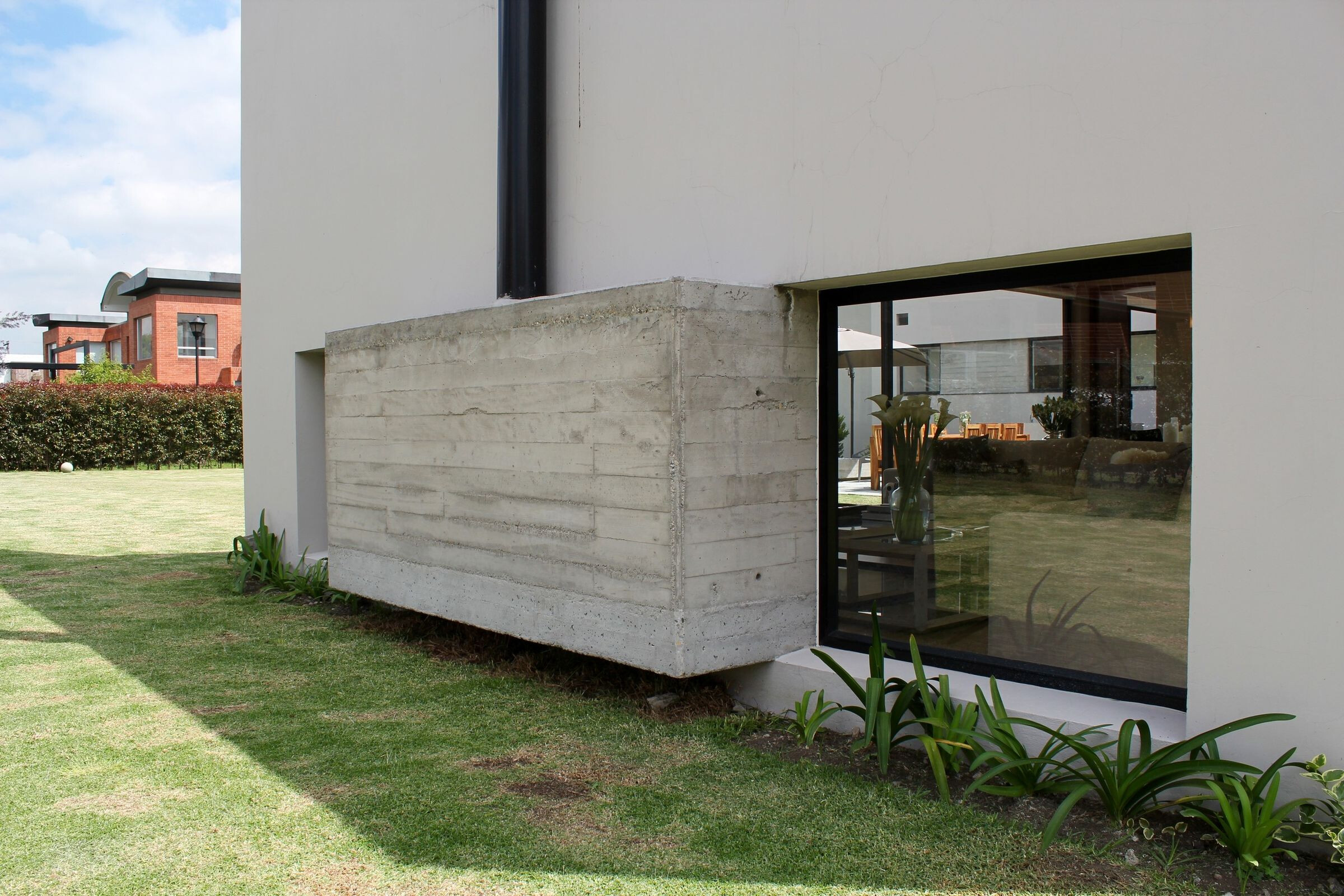 哥伦比亚 L 型别墅 · Campuzano Arquitectos 的室内外一体化设计-14