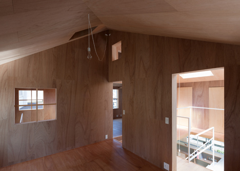House in Kawanishi by Tato Architects with hipped roof and stilts-20