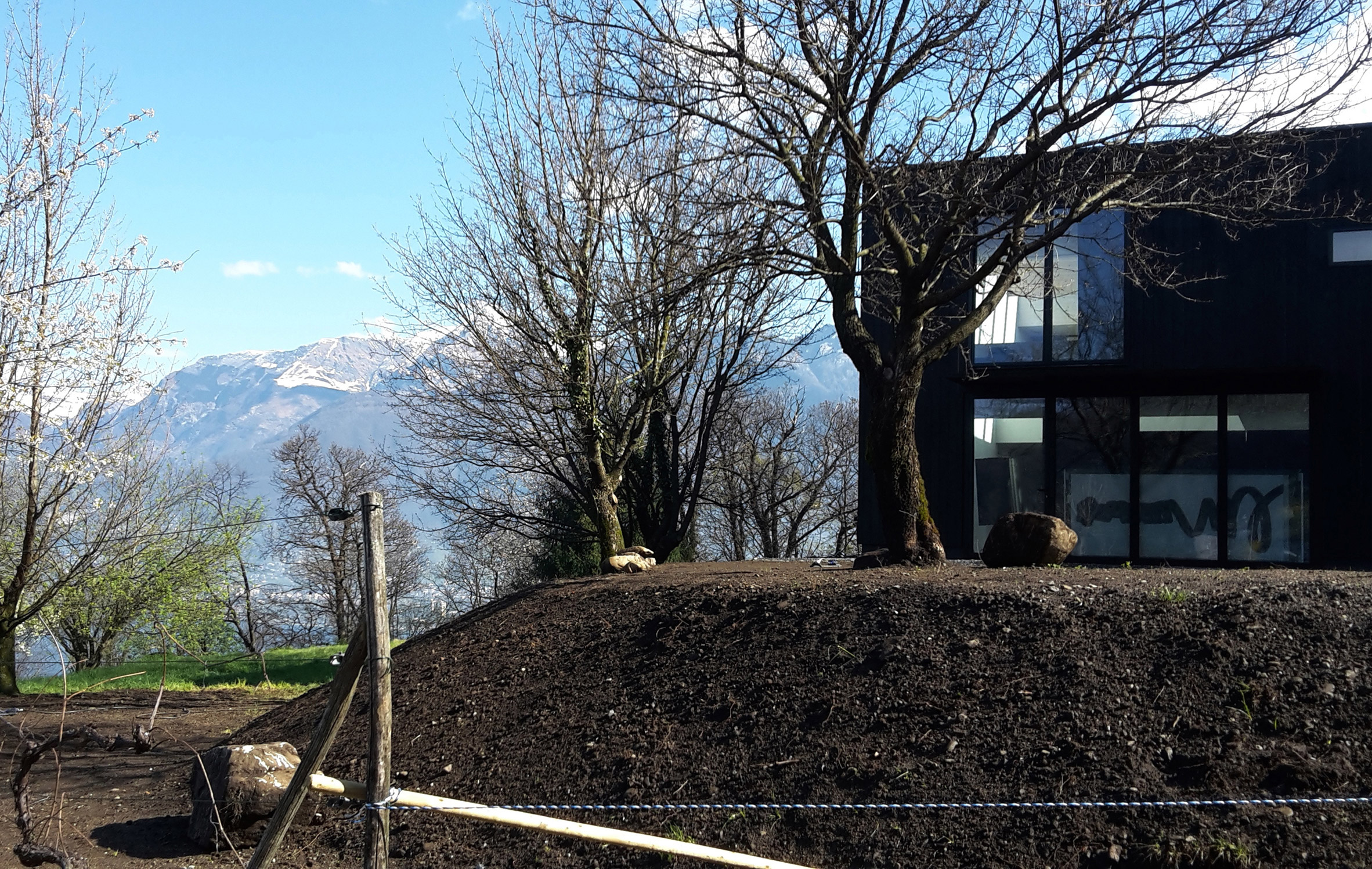 This prefabricated wooden holiday home is clad in charred timber boards-8