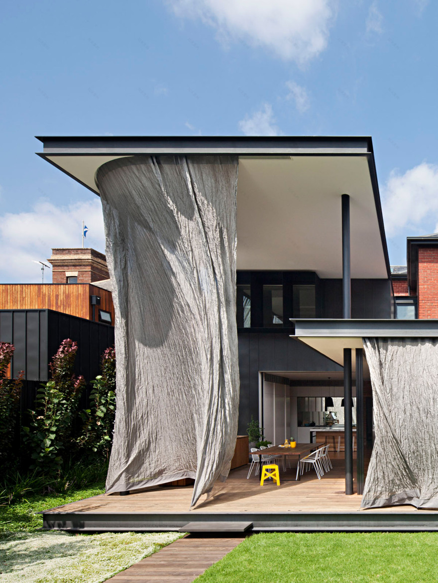 "Free flowing and kinetic" metal-mesh curtain wraps around extension to Melbourne house-2