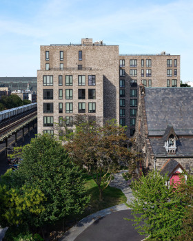 Dattner Architects uses gothic details to integrate housing with Bronx church