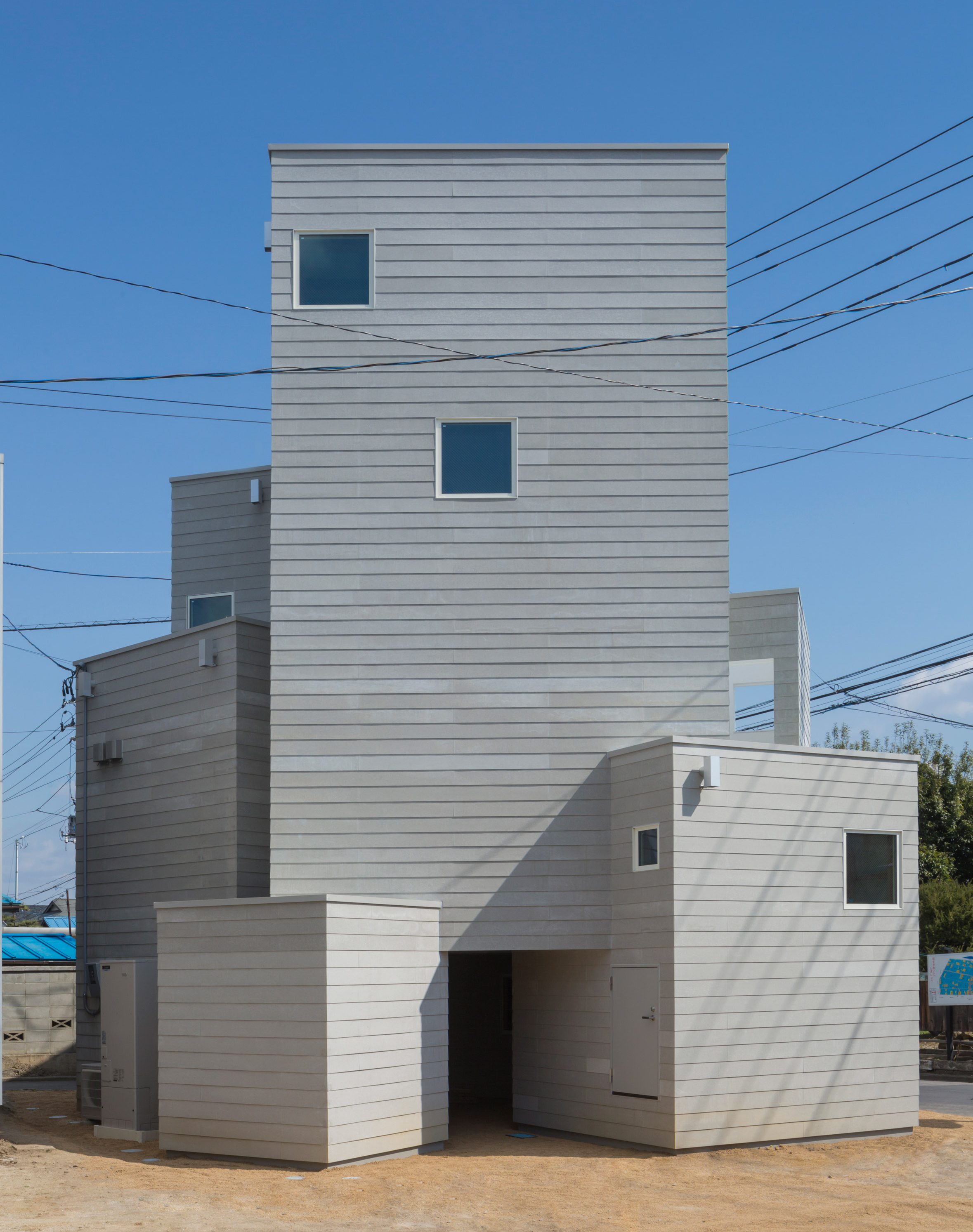 Cohta Asano builds his new Fukushima home as a cluster of nine cuboids-4