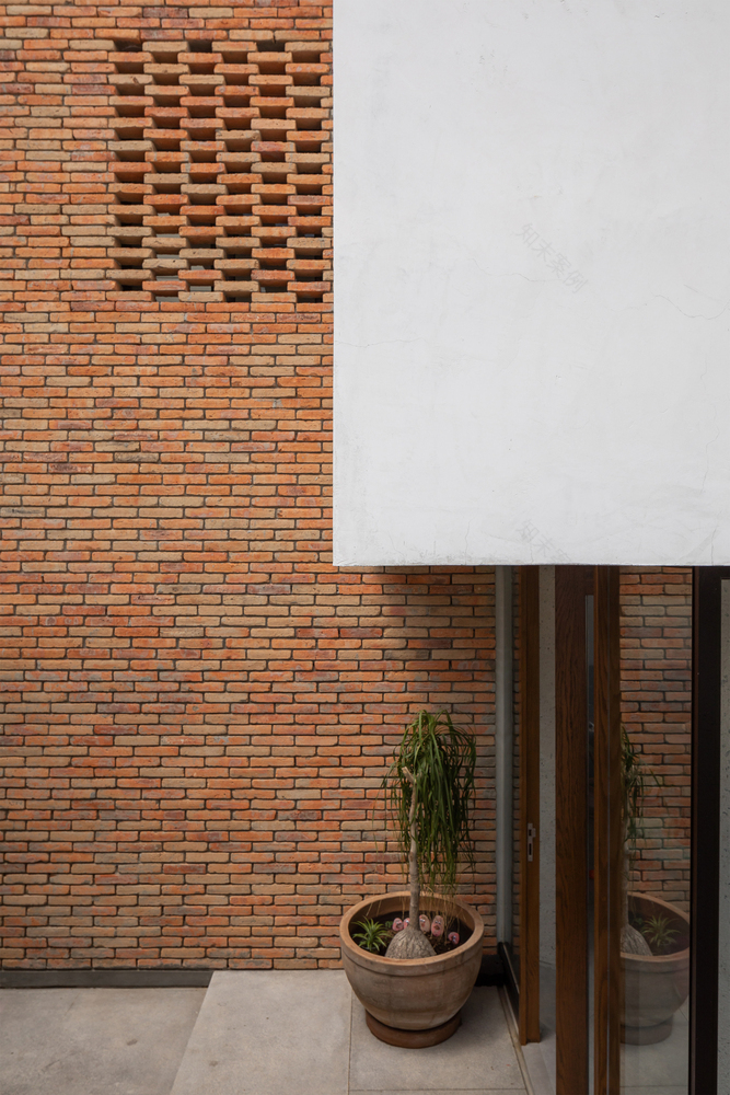 灵活空间满足家庭成长需求的双元素建筑-30