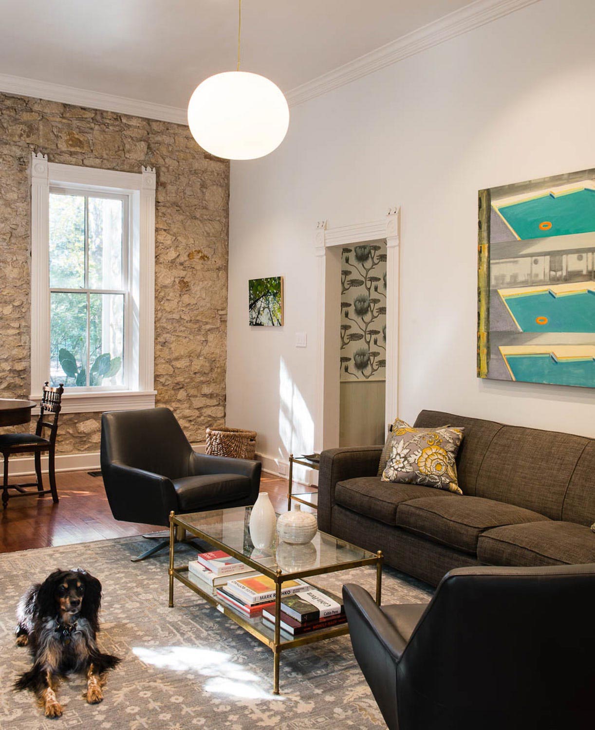 Modest, thick walled stone structure built in 1871 that sits within view of the castle on the hill   CAANdesign  Architecture and home design blog-10