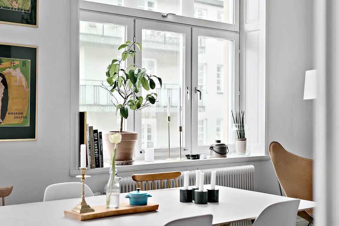 巧用家具打造 52 平米公寓的自行车收纳空间-6