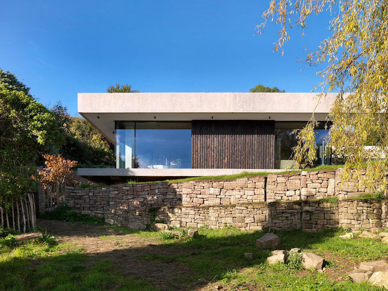 Sunken House With A Courtyard Built Into The Hillside-4