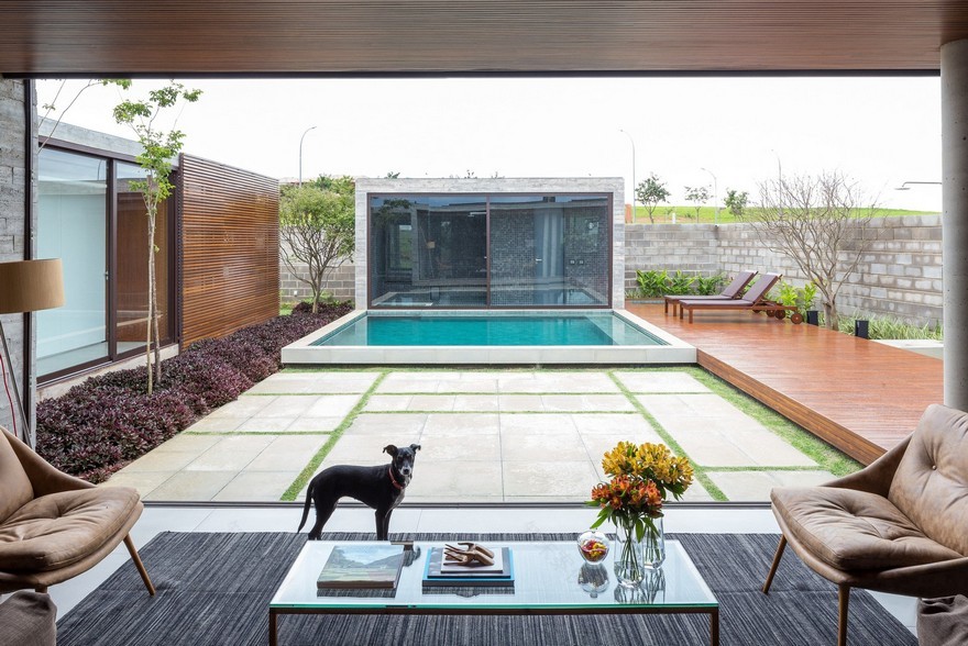 One Level Concrete House Providing Spaces for Leisure and Socializing-13