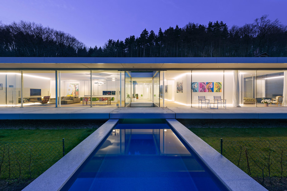 Villa K by Paul de Ruiter Architects lies long and low on a German hillside-21