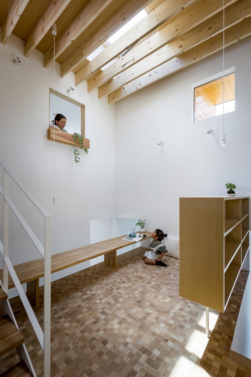 Box-Shaped Japanese Home with Warm Minimalist Interior Design-12