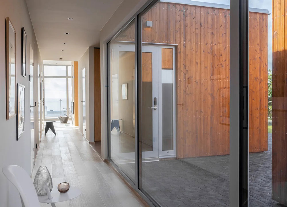 瑞典现代海景公寓 | 阳光倾洒的玻璃海洋-17