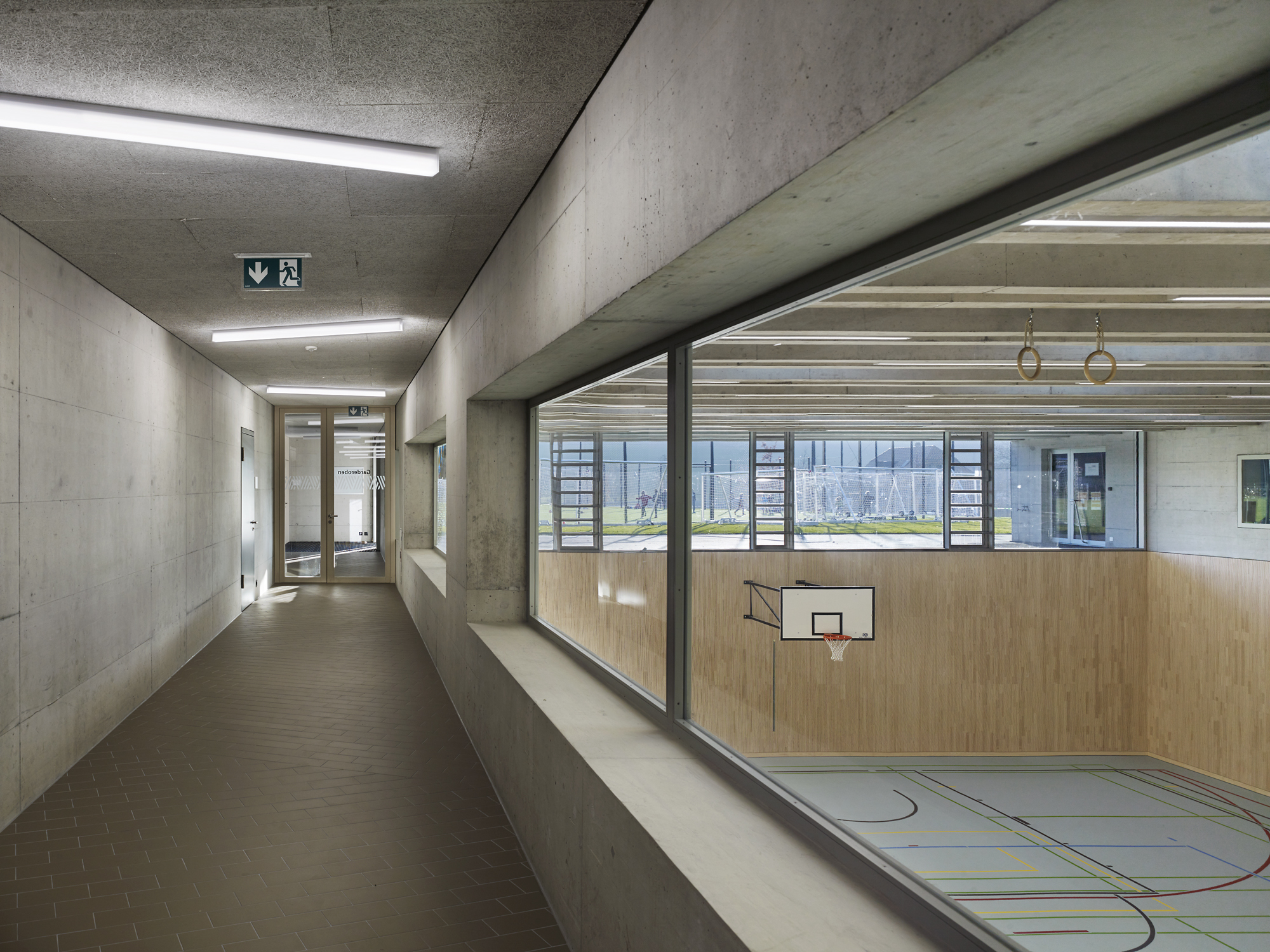 NiederwangenRied 学校和运动场丨瑞士丨BüningPfaue Kartmann Architekten-39