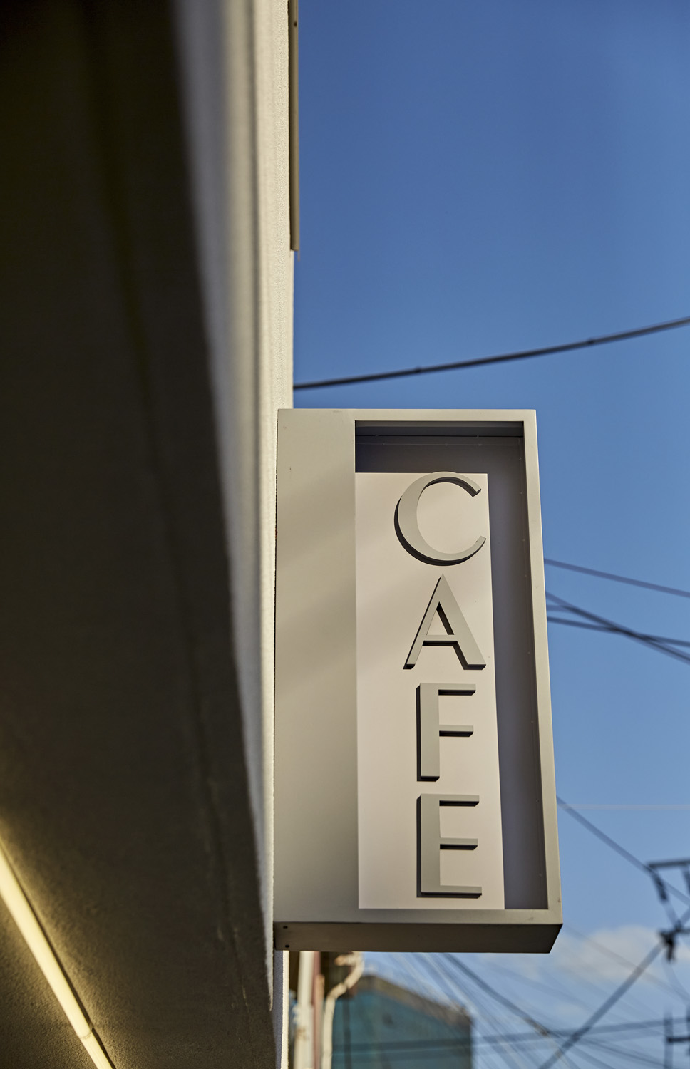 14 平米微型咖啡馆，裸露混凝土打造别致空间-17