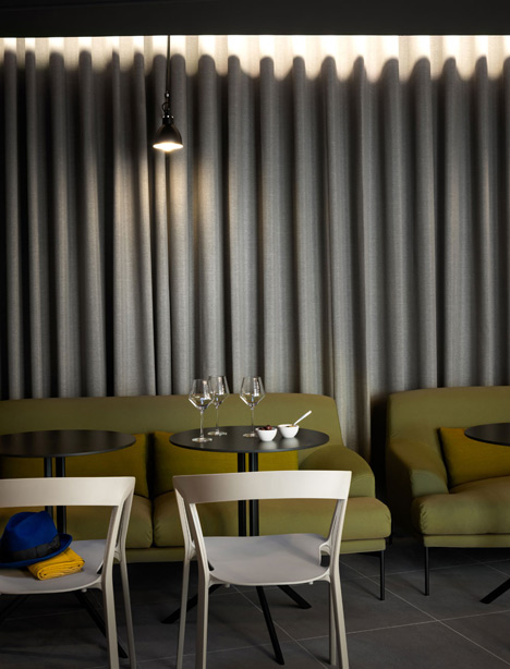 Okko hotel interior by Patrick Norguet with en suites behind louvred walls-26