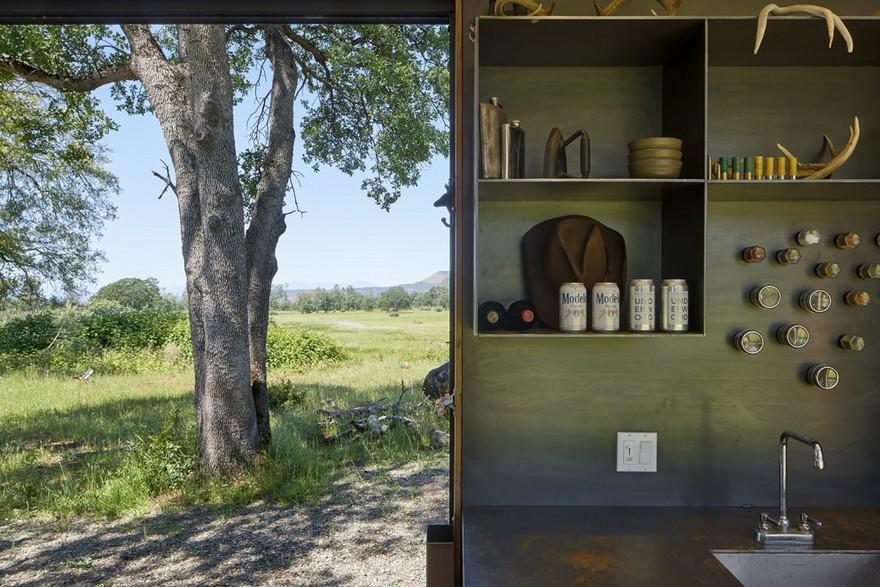 40′ Highboy Shipping Container Turned into a Cozy Hunting Cabin-11