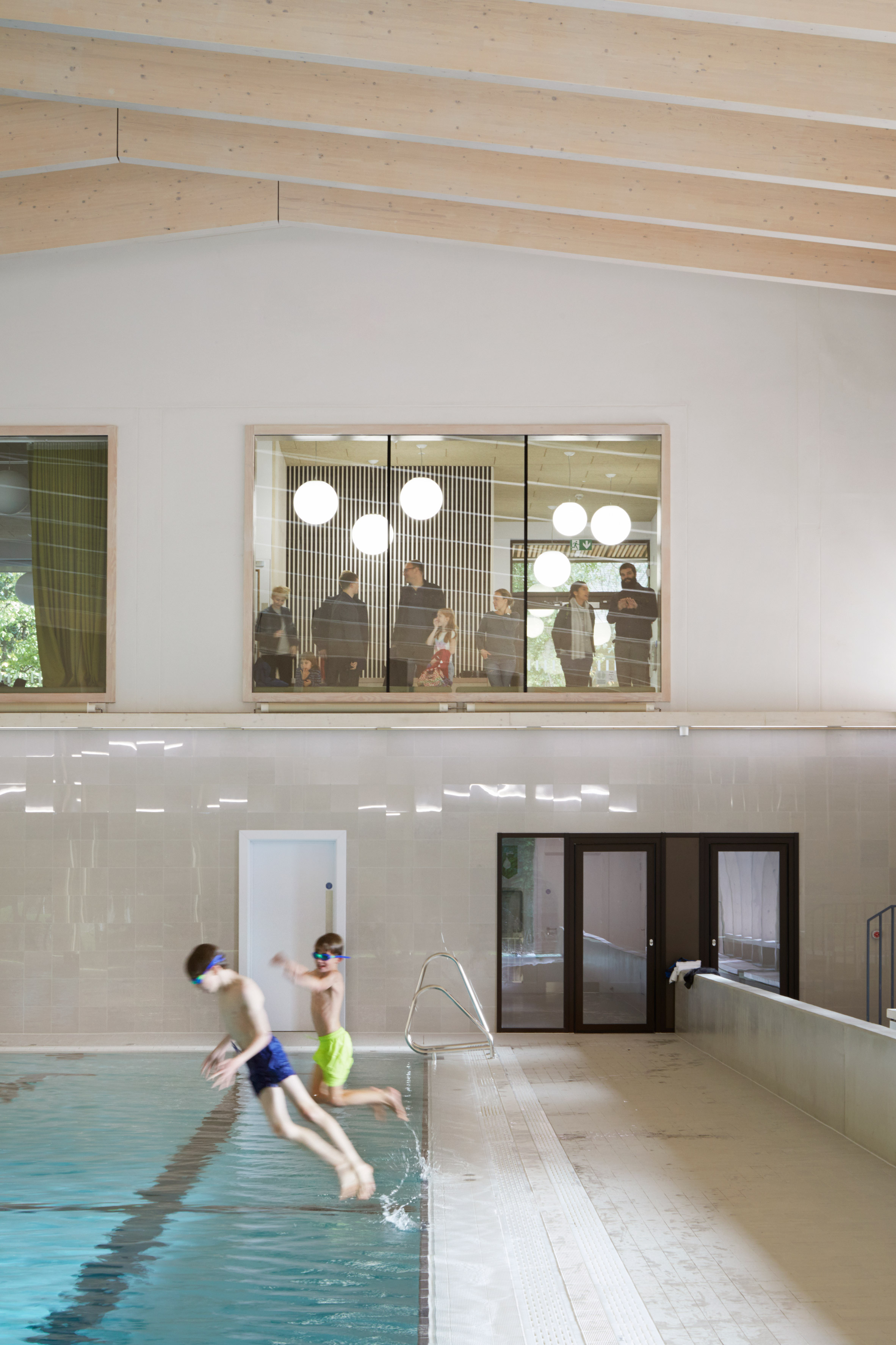 HawkinsBrown uses engineered wood to build school swimming pool-14