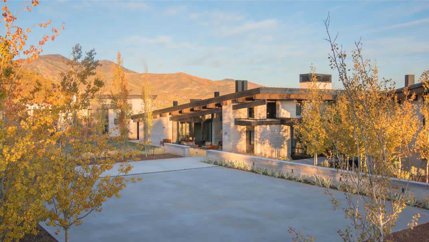 Majestic mountain home of stone and glass dominates its Utah landscape-3