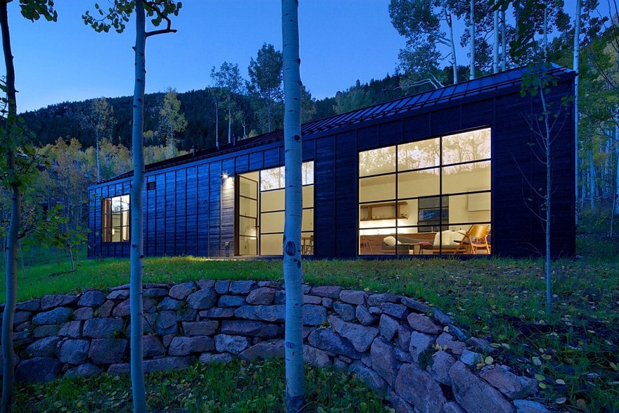 Cottage Black Provides a Retreat Within a Dense Aspen Grove-23