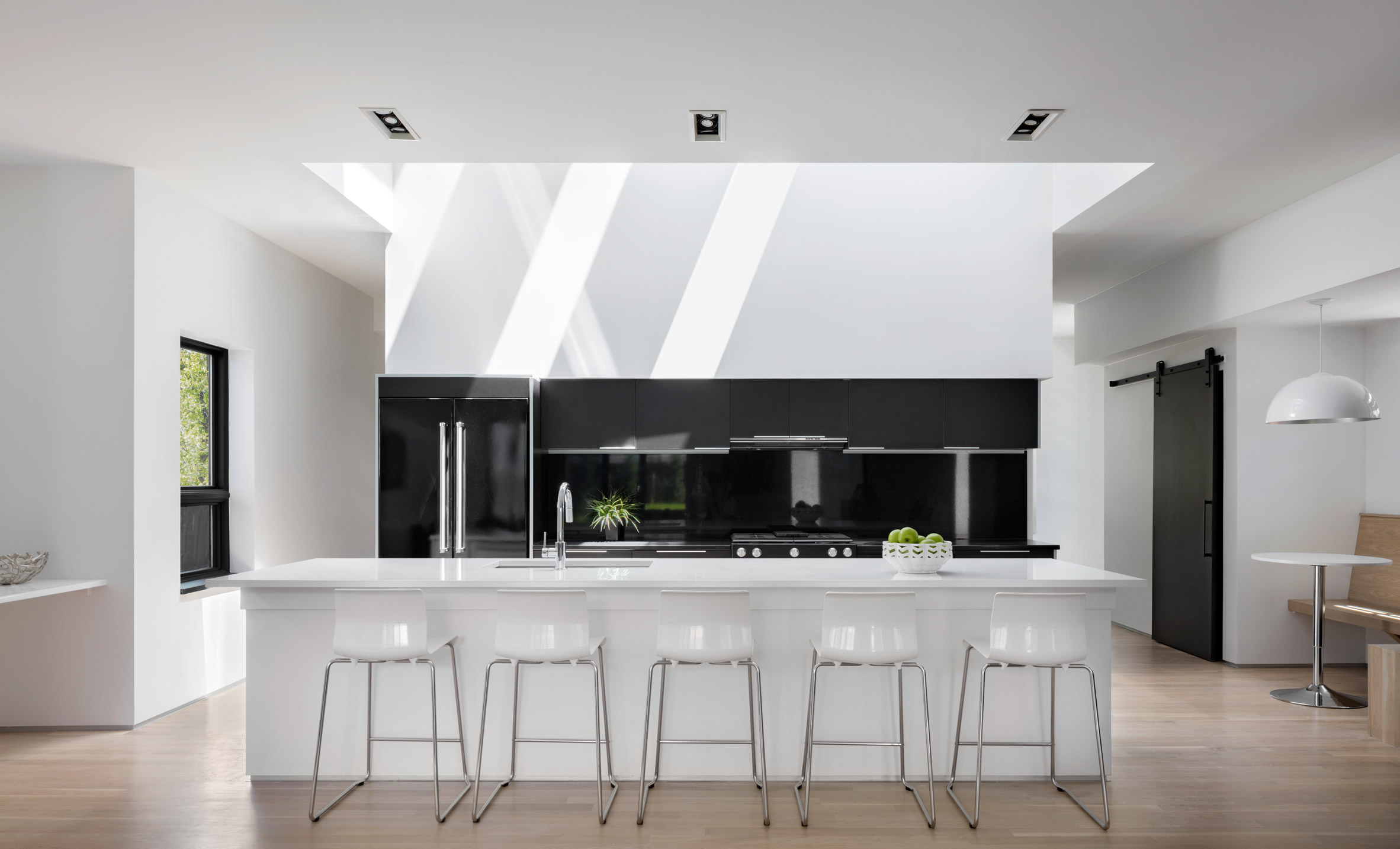 Meridian 105's Denver house features screens and shutters made of black wooden pallets-13