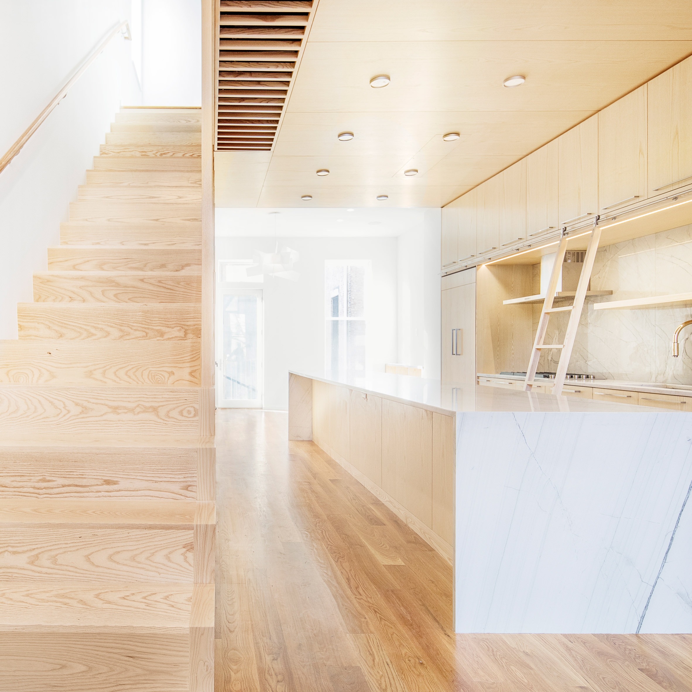 Jeff Jordan pairs white marble and pale pine in Jersey City house renovation-0