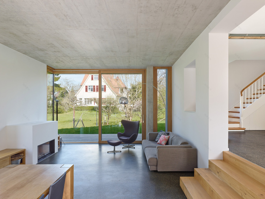 Holzer Architekten adds black extension to 1920s house in Stuttgart-5