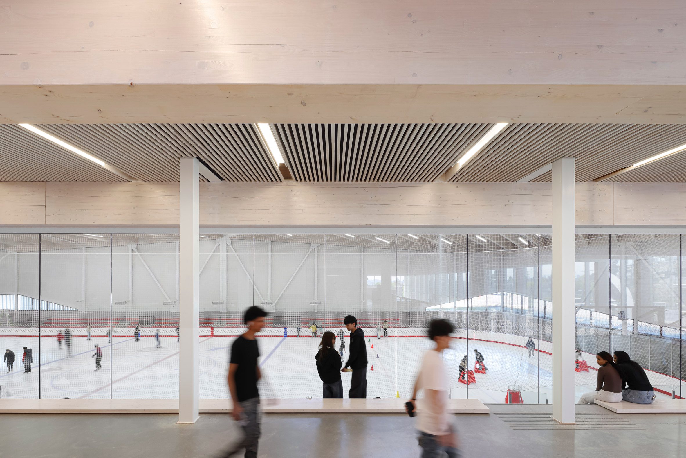 Mass timber adds visual warmth to British Columbia ice arena by HCMA-37