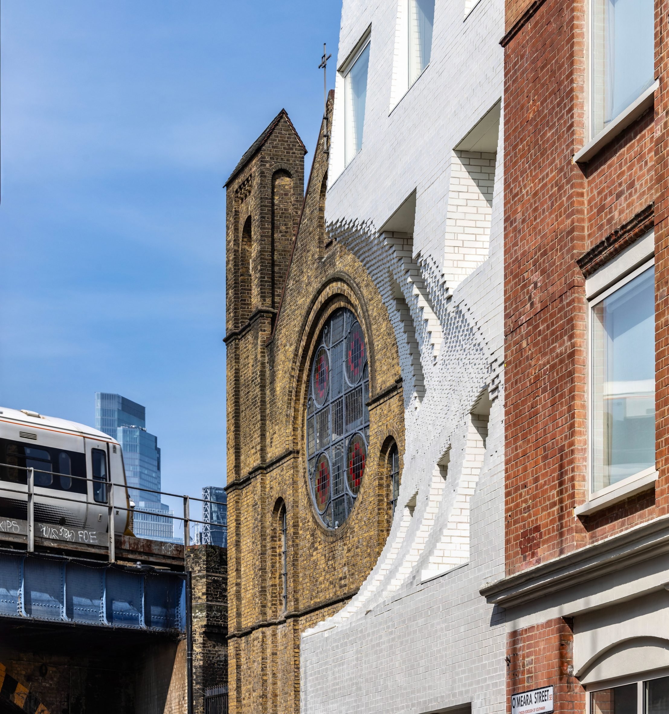 Corstorphine & Wright carves scoop into office facade to celebrate neighbouring church-3