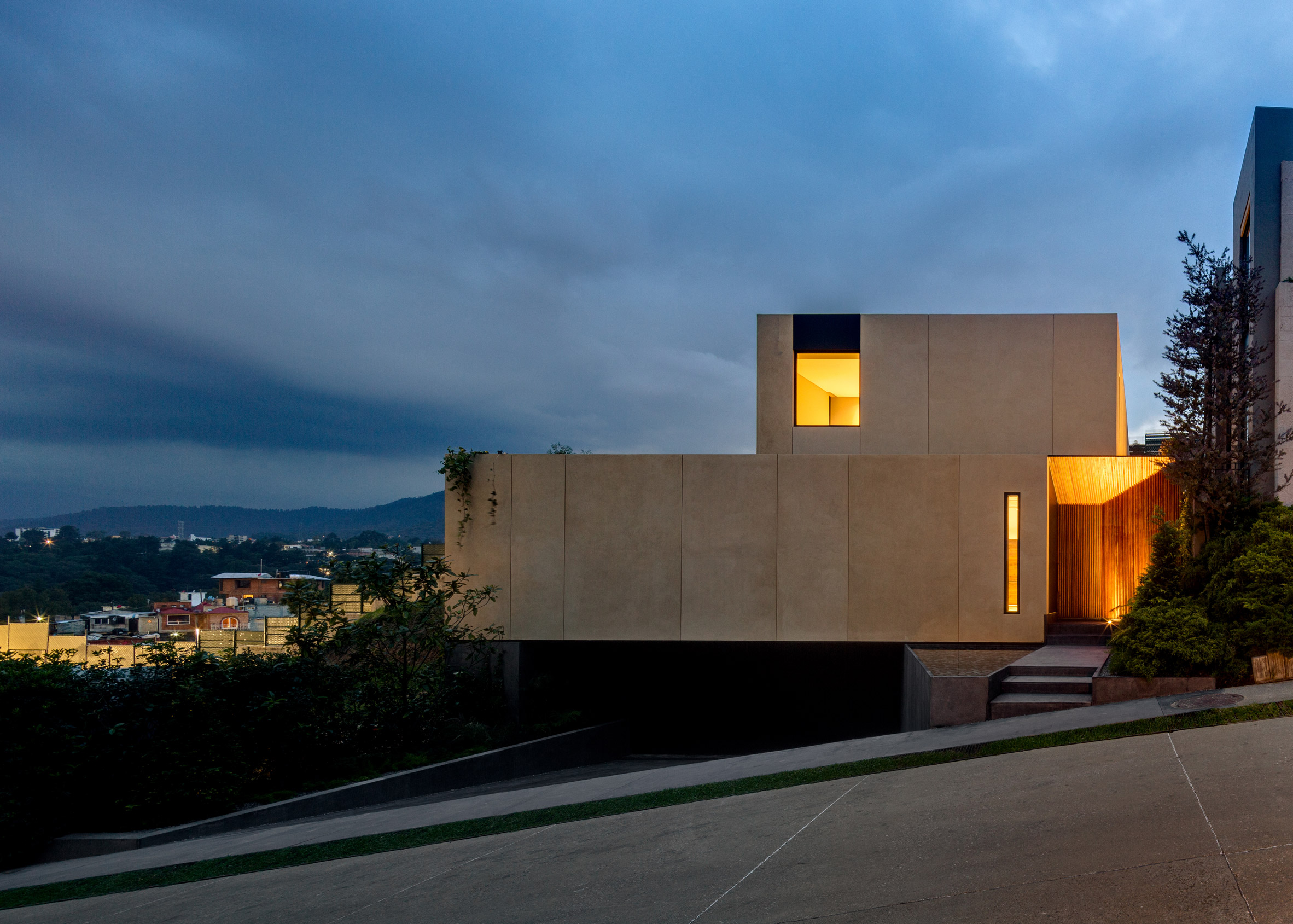 ASP constructs Cumbres House using compressed earth blocks formed on-site-27