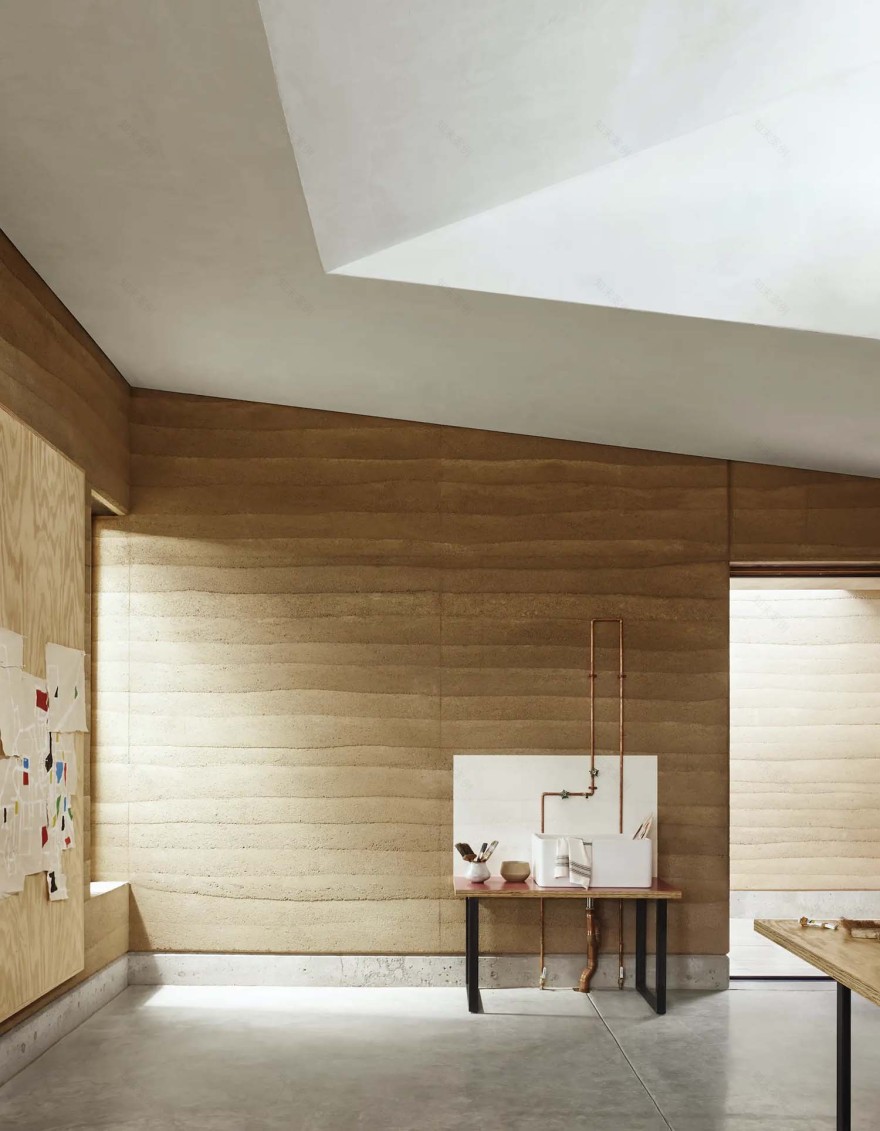 See this remarkable rammed earth house nestled on a Texas ranch-26