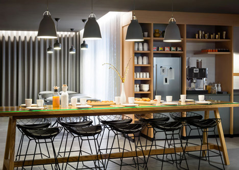 Okko hotel interior by Patrick Norguet with en suites behind louvred walls-28