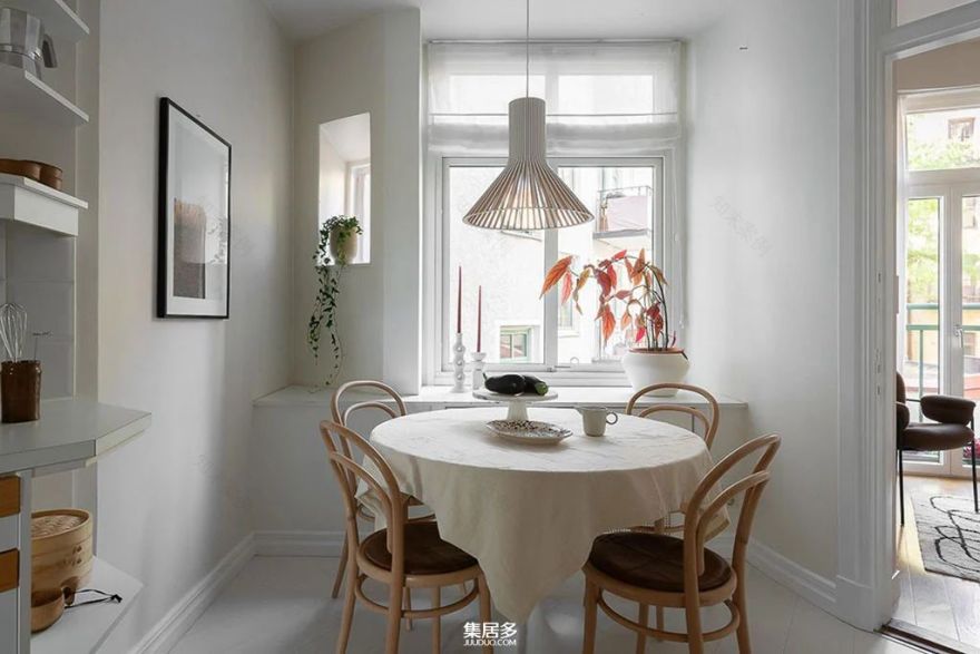 明亮斯堪的纳维亚公寓中的画廊式墙面点亮家居艺术-22