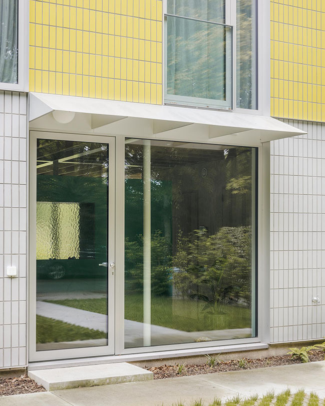 House + Workshop by studio MOTO | Sustainable Design with Harmonious Yellow Tile Facade-3