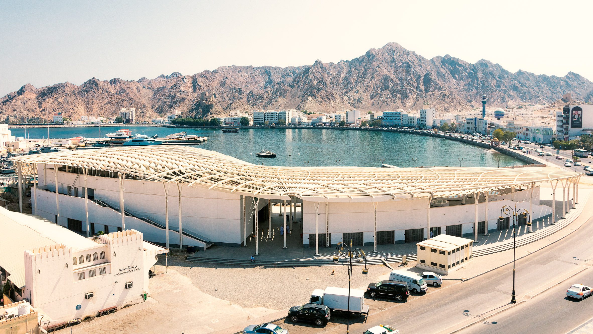 Snøhetta fish market features slatted canopy inspired by Arabic calligraphy-0