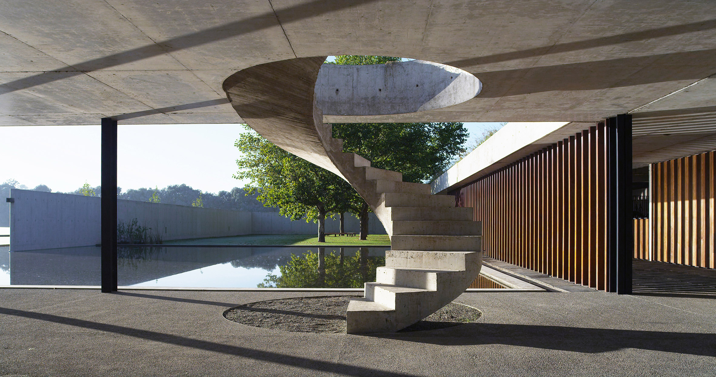 Polo stables features grassy roof for horses to graze and spectators to sit-2