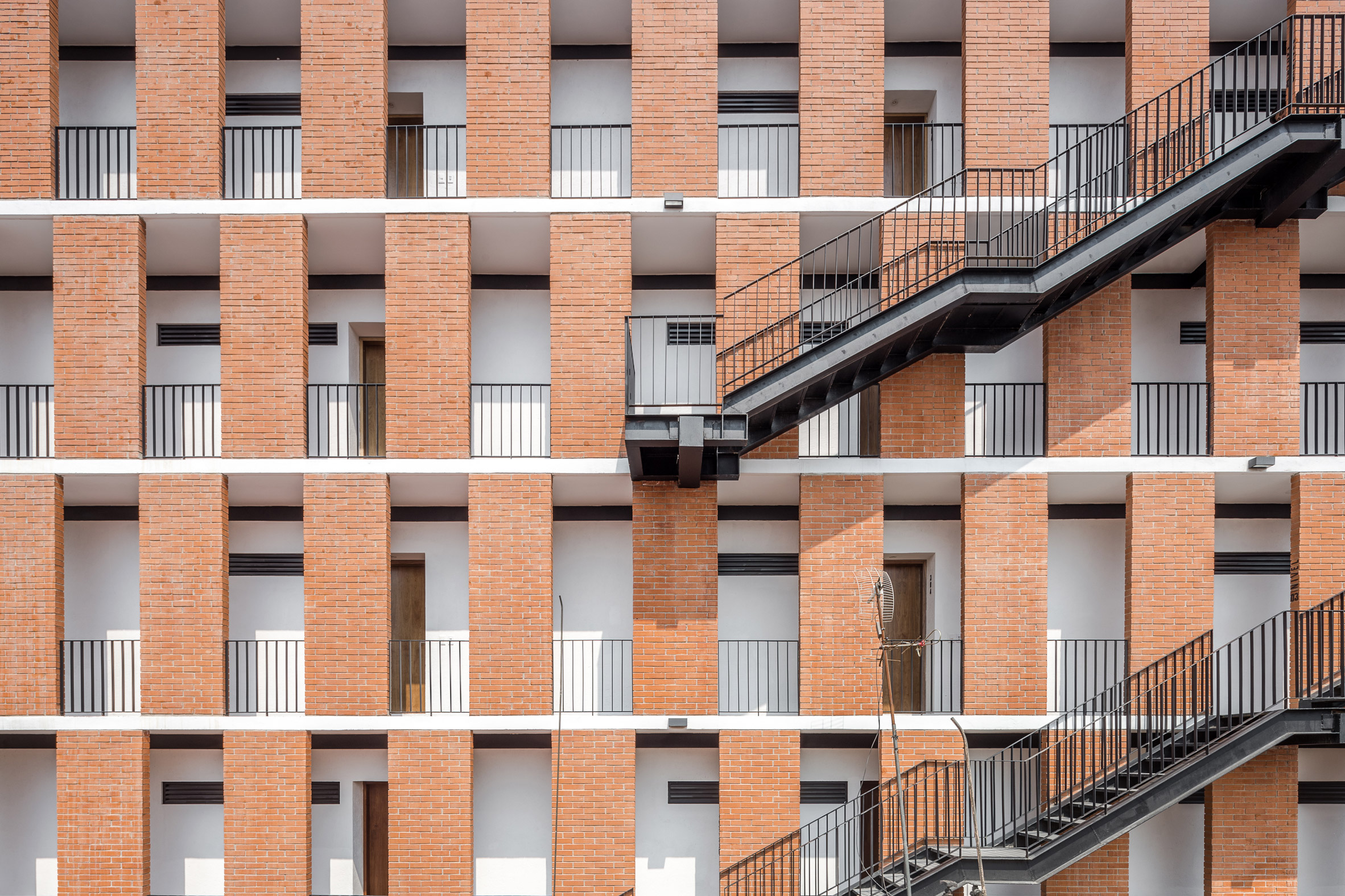 HGR Arquitectos uses orange bricks to build Mexico City apartment block-4