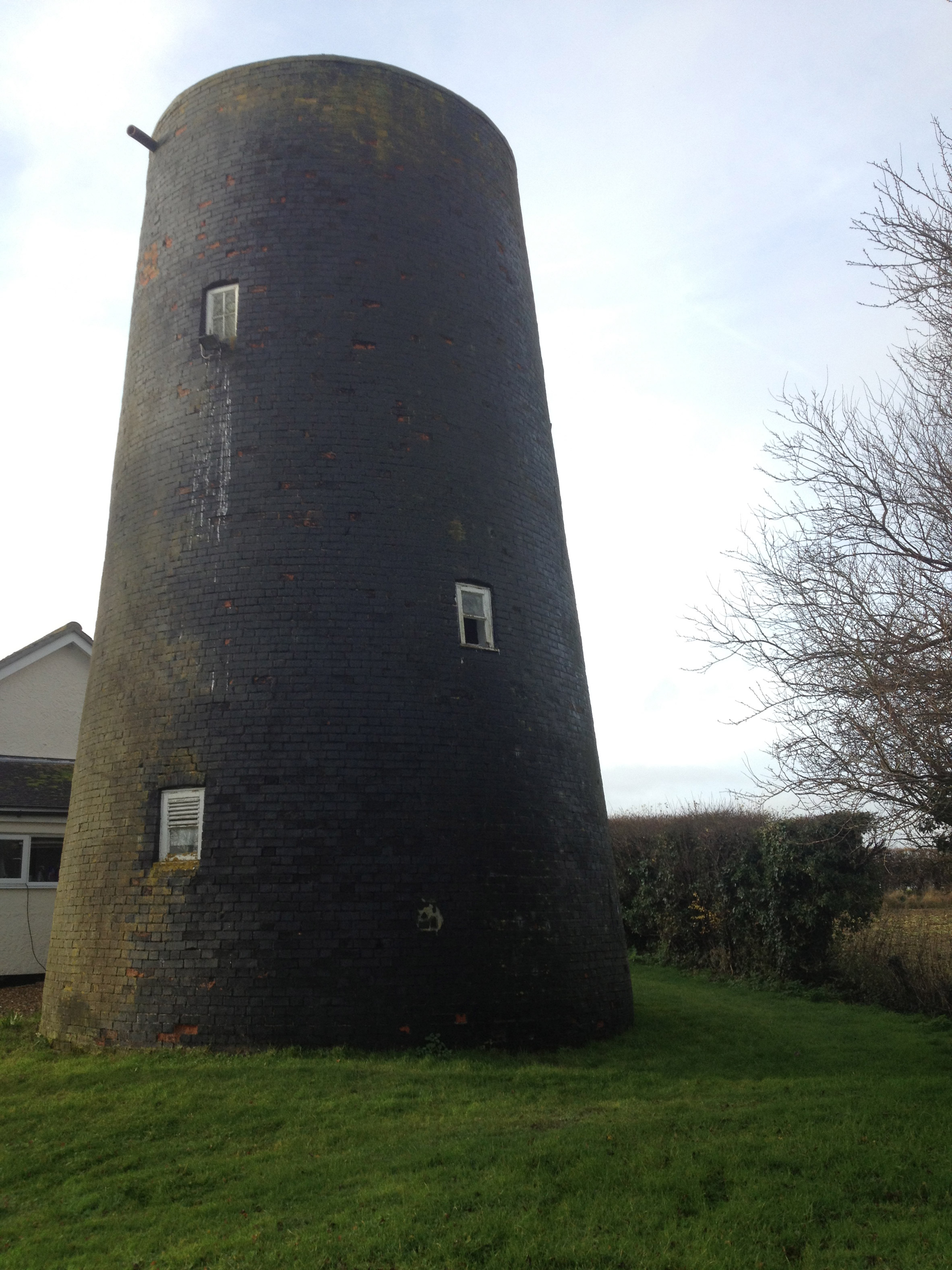 Beech Architects creates guest house inside derelict Suffolk windmill-11