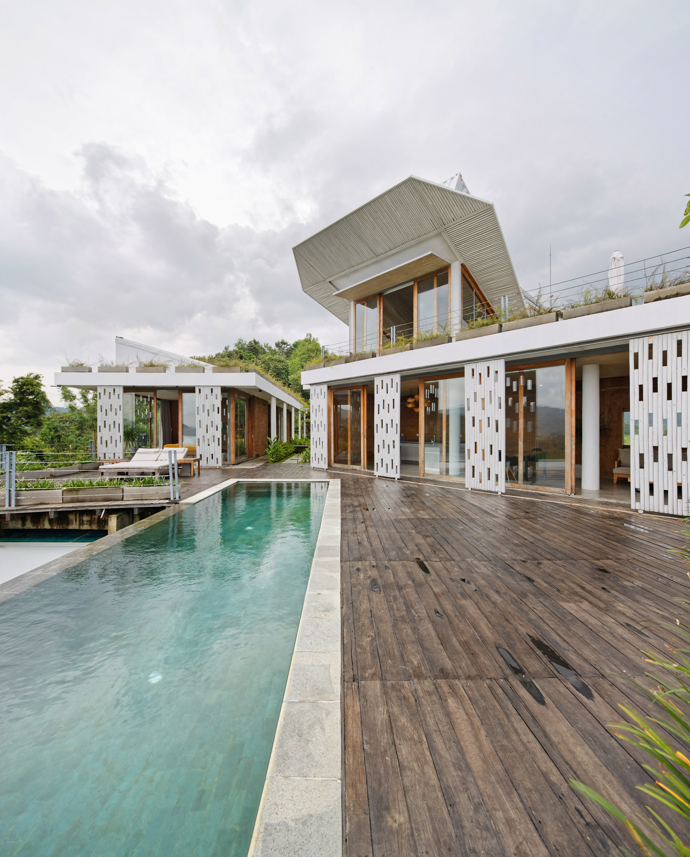 Budi Pradono tops hillside house in Lombok with tilted shipping container-9