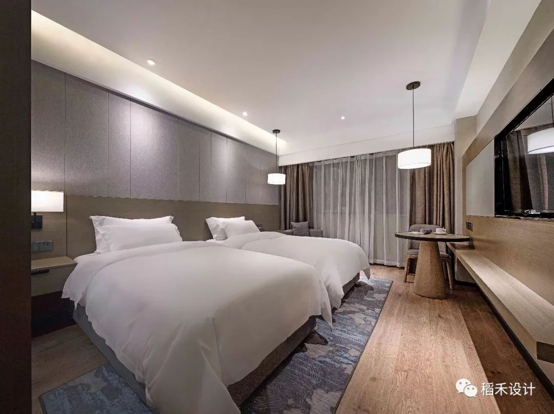 暖棕色调打造温馨空间——鸿宝大酒店室内设计-27
