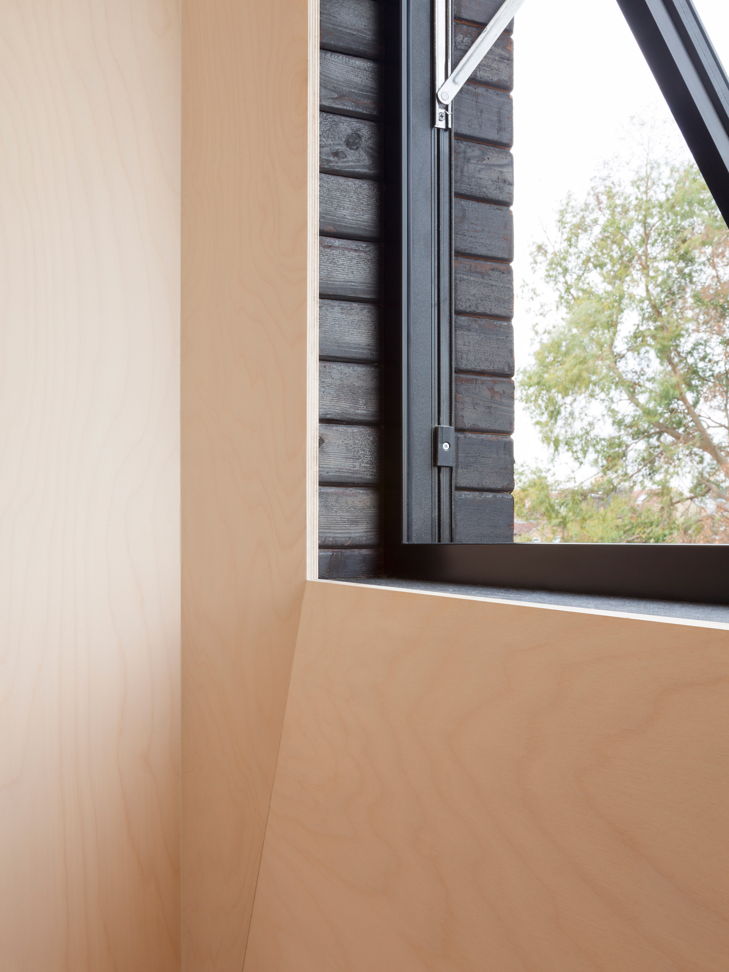 Plywood-lined bedrooms feature in loft conversion by Widger Architecture-14