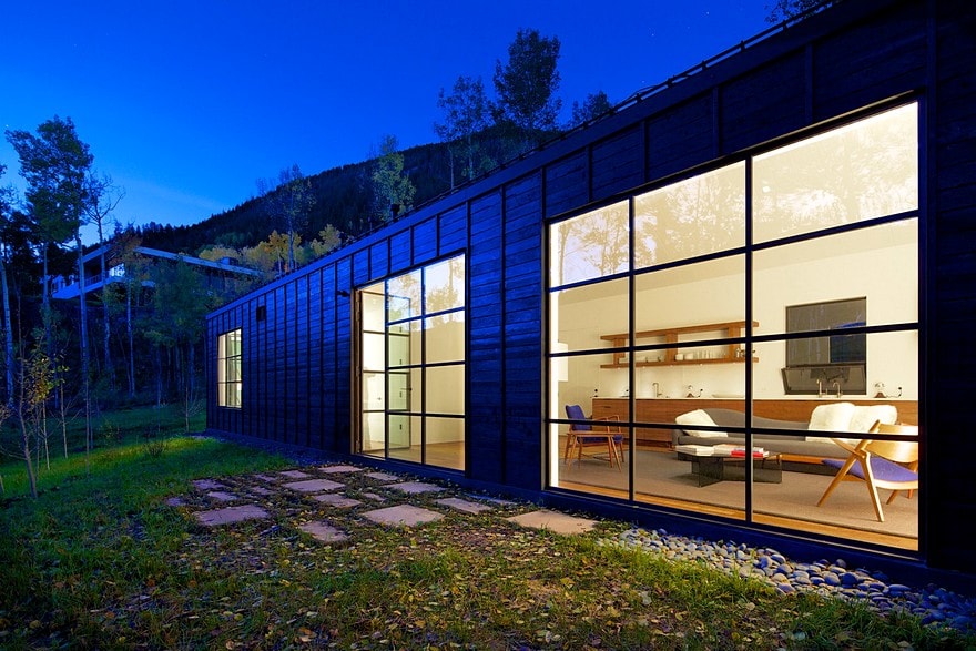 Cottage Black Provides a Retreat Within a Dense Aspen Grove-22