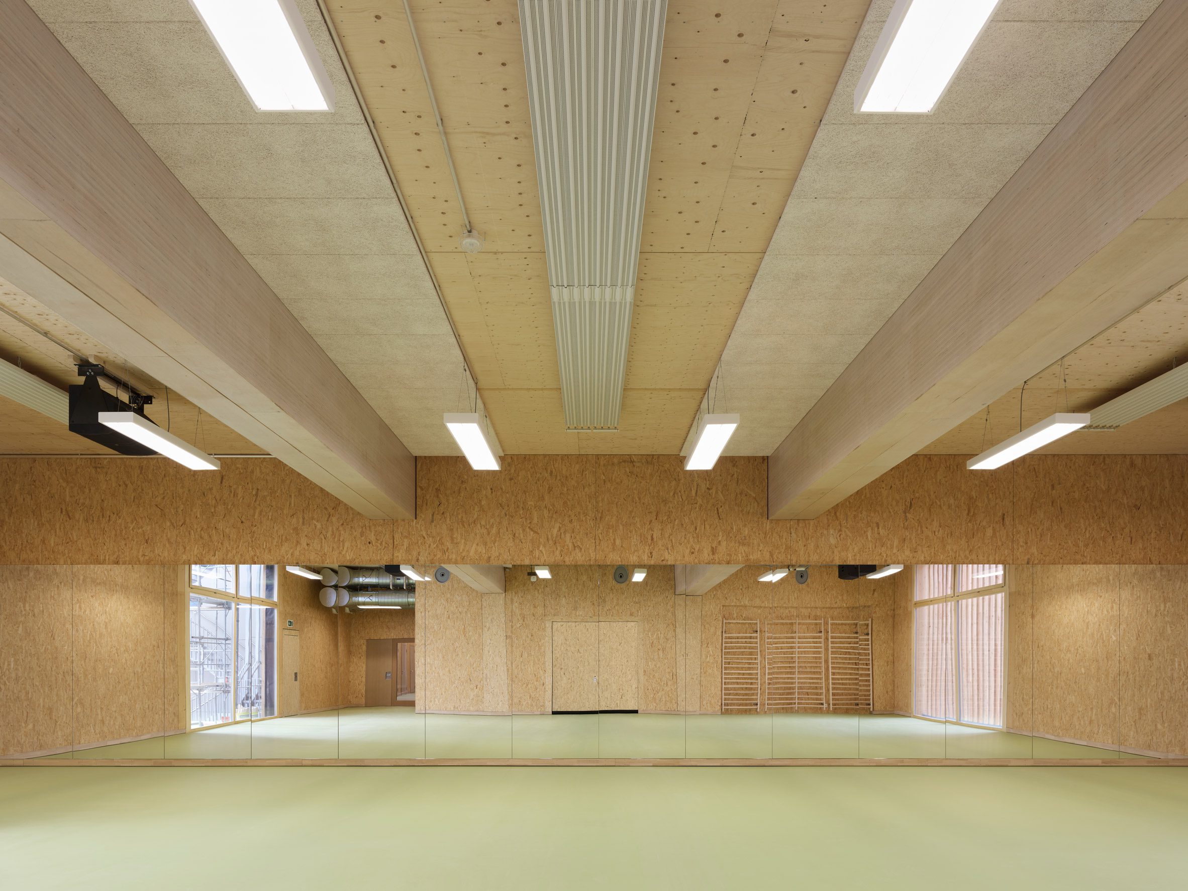 Itten+Brechbühl creates demountable timber sports hall for University of Zurich-25