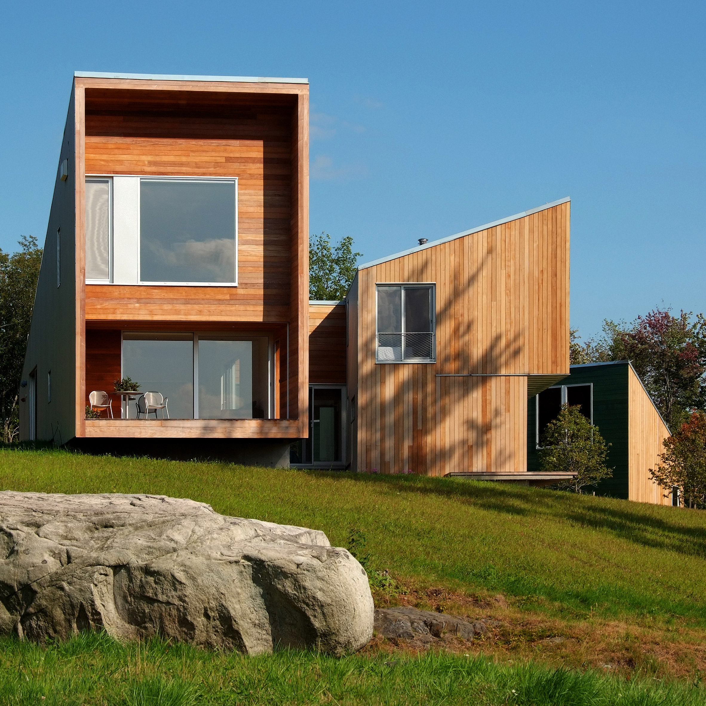 Staggered volumes of house by KSW Architecture frame views of Vermont meadow-0