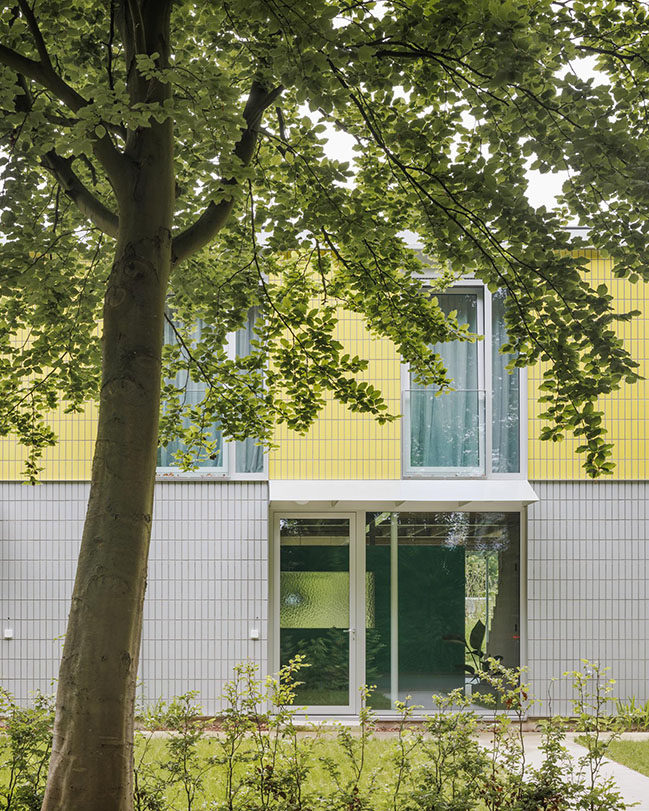 House + Workshop by studio MOTO | Sustainable Design with Harmonious Yellow Tile Facade-2